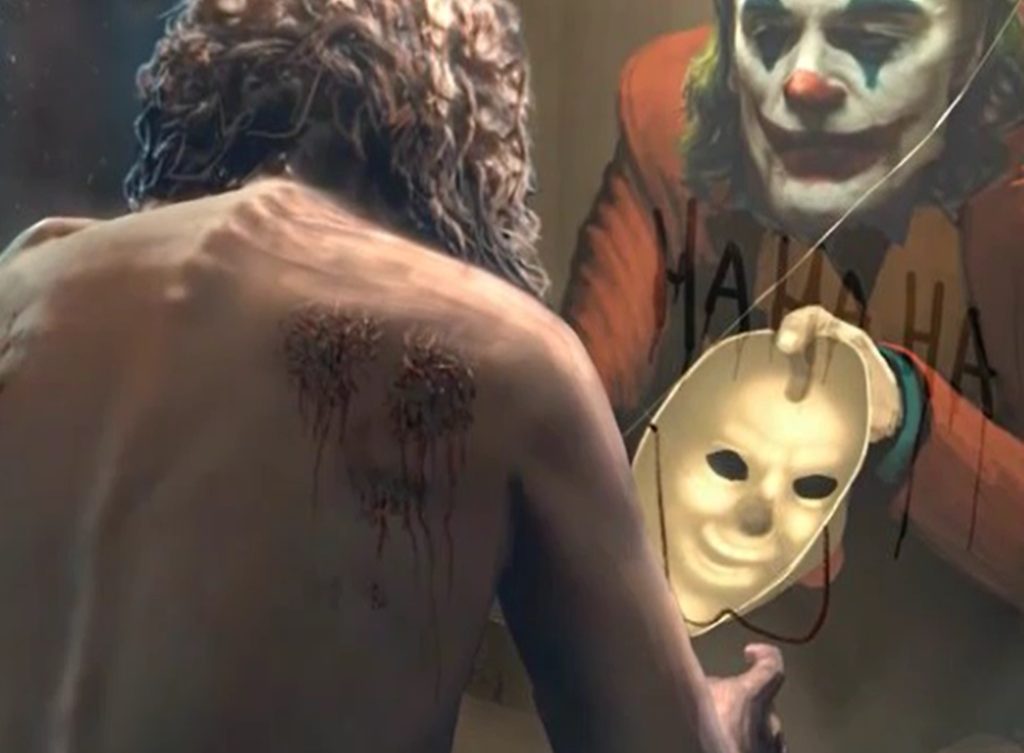 Joker gives the mask to Arthur Fleck 