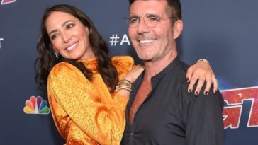Lauren Silverman and Simon Cowell arrives at the America's Got Talent Season 14 Live Show Red Carpet